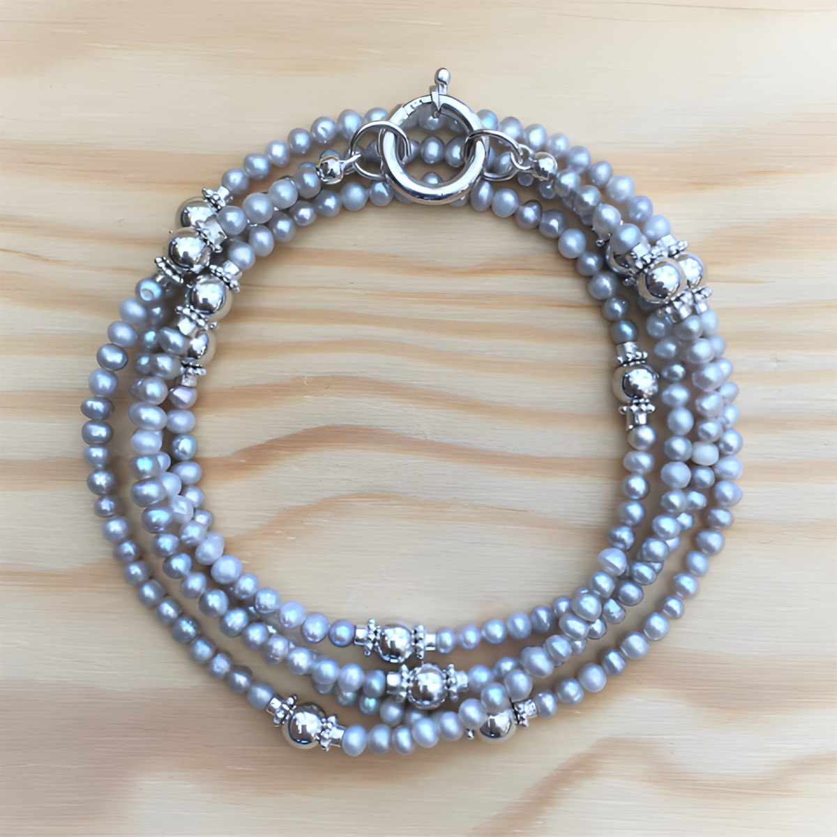 es12-suesswasserperle-grau-4-mm-silber.jpg