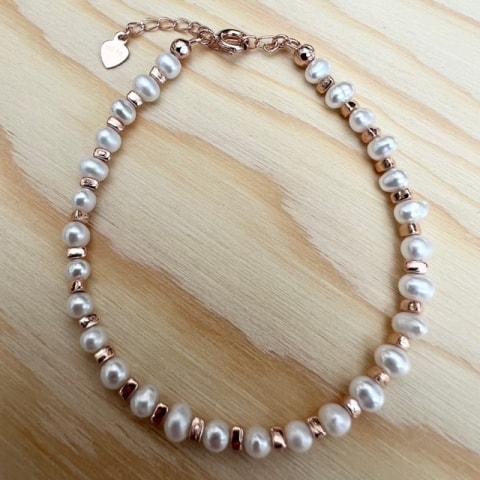 ab107-suesswasserperle-weiss-ca-4-mm-rose-vergoldet.jpg
