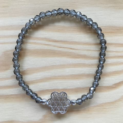 ab38-facettierter-bergkristall-bedampft-4-mm-blume-des-lebens-silber.jpg