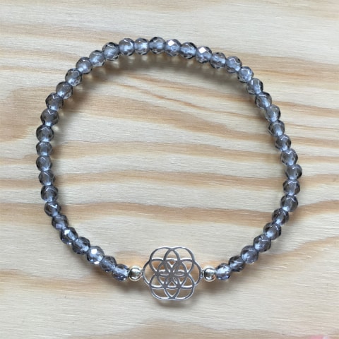 ab38-facettierter-bergkristall-bedampft-4-mm-venusblume-silber.jpg