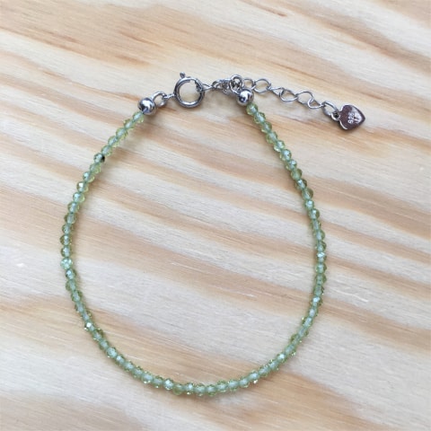 ab80-facettierter-peridot-ca-25-mm-silber-rhodiniert.jpg