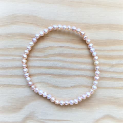 abp12-suesswasserperle-lachs-elast-armband-ca-4-mm.jpg