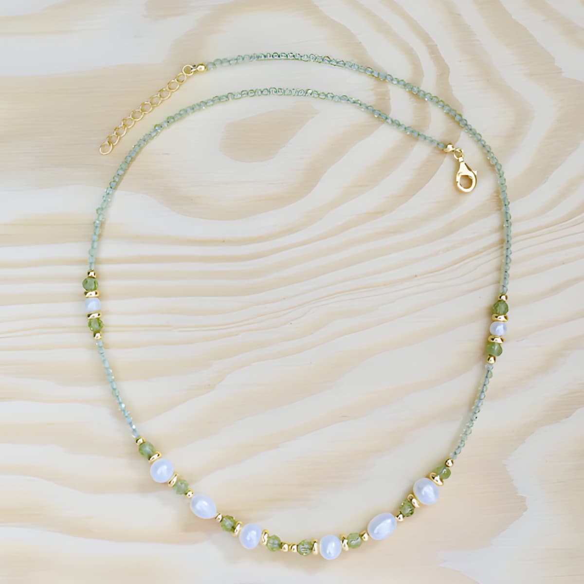 es27-facettierter-peridot-suesswasserperle-silber-vergoldet-16969.jpg